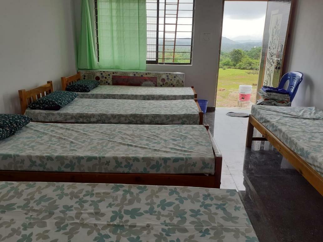M G Cottage & Dormitory Gokarna  Exterior photo